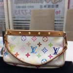 ヴィトン ポーチ スタッズ M92649